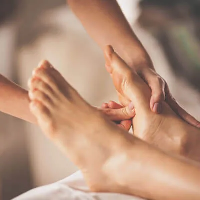 person getting foot massage