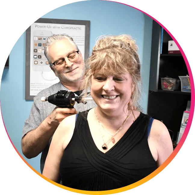 Dr Johr adjusting patients neck
