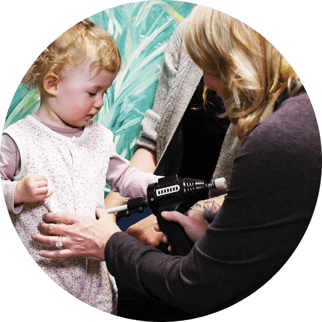Dr Saylor adjusting child