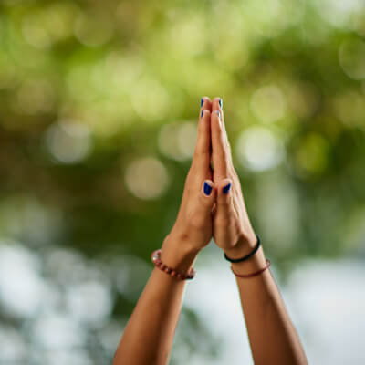 Hands raised together in trust and support